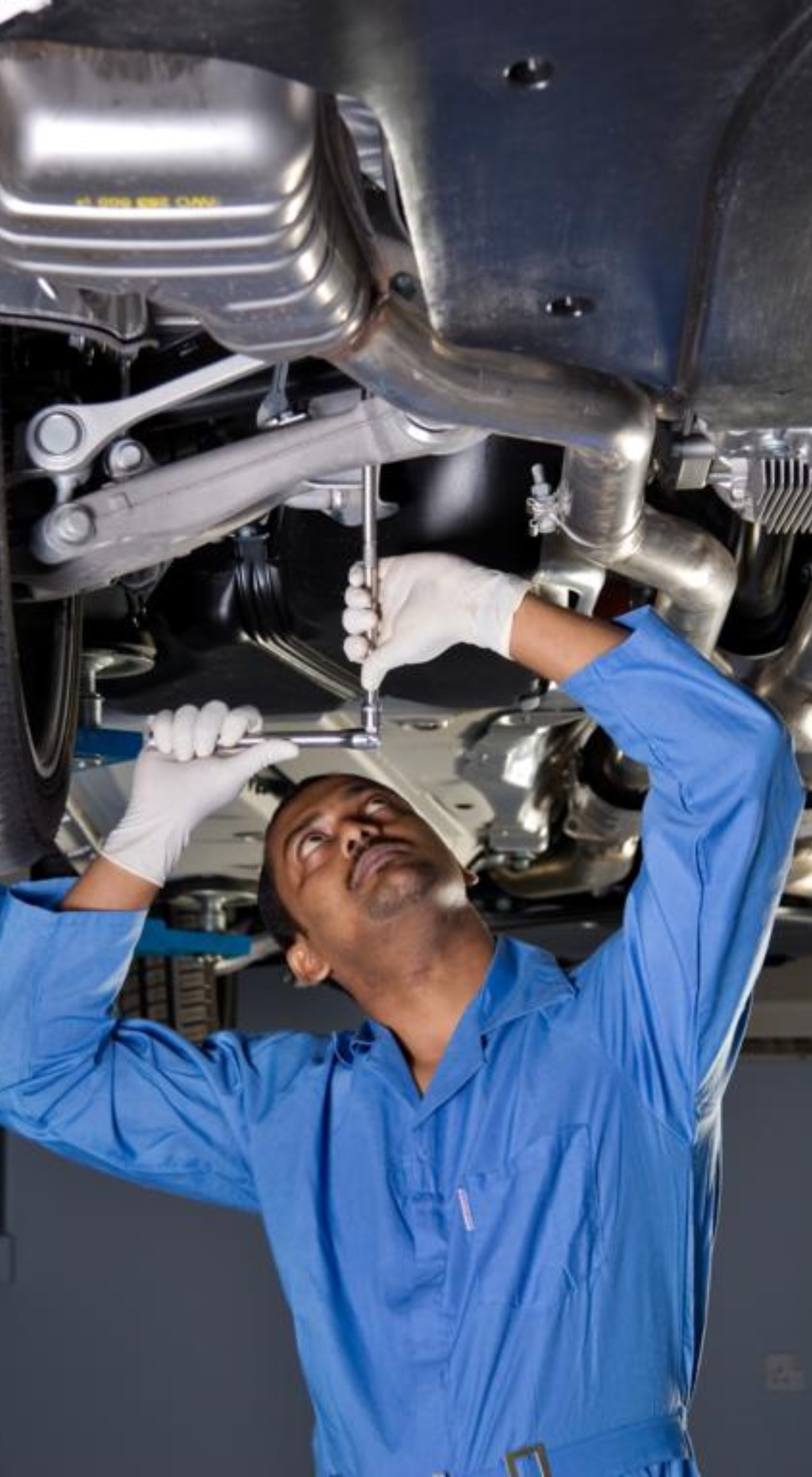 Mechanic Man Fixing A Car